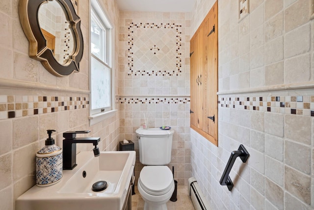 8 Jackson Ave, Hampton Bays, NY 11946 - bathroom with tile walls, toilet, a baseboard radiator, and a sink