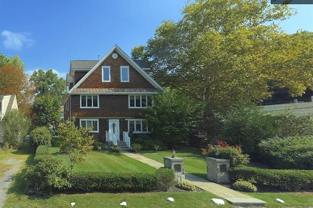 2 Goldwin St, Rye, NY 10580 - view of front of property with a front lawn