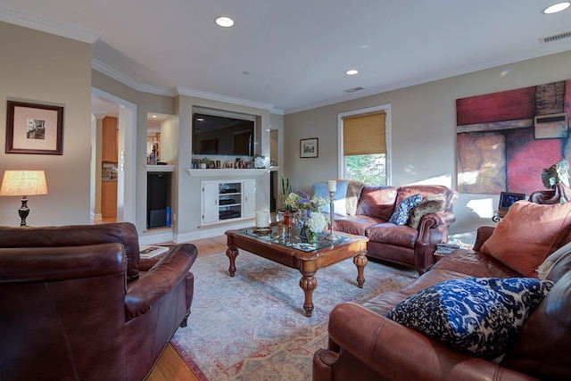 2 Goldwin St, Rye, NY 10580 - living area featuring ornamental molding, wood finished floors, recessed lighting, and a fireplace
