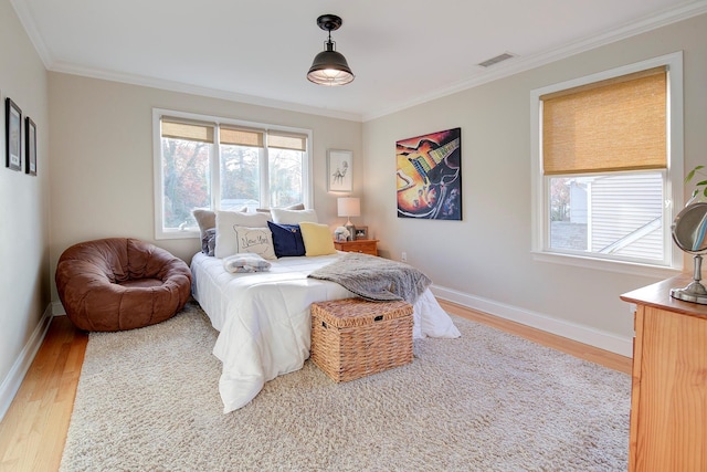 2 Goldwin St, Rye, NY 10580 - bedroom featuring light wood-type flooring, ornamental molding, and baseboards