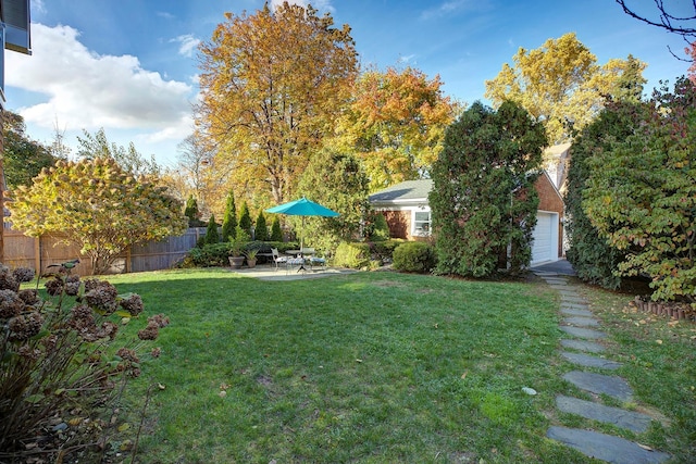 2 Goldwin St, Rye, NY 10580 - view of yard with a patio area and a garage