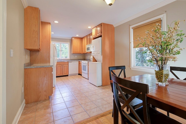 2 Goldwin St, Rye, NY 10580 - kitchen with white appliances, crown molding, light tile patterned floors, recessed lighting, and a sink