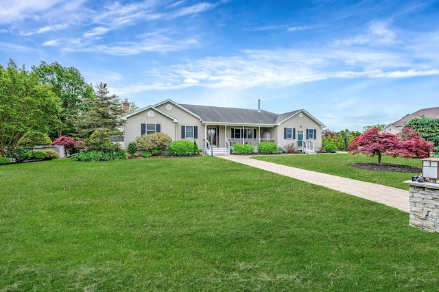 320 Williams Way S, Baiting Hollow, NY 11933 - ranch-style home featuring covered porch, a front lawn, and a chimney