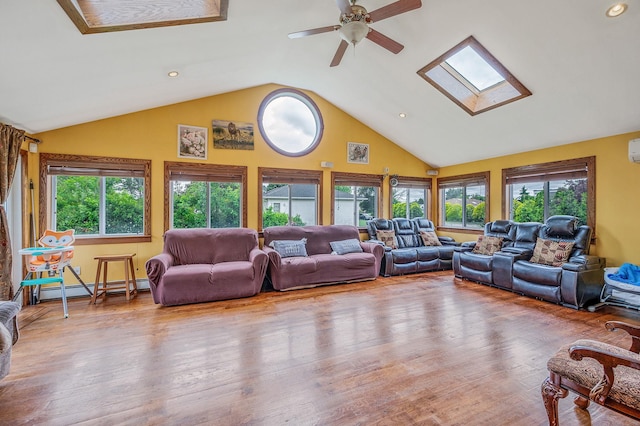 320 Williams Way S, Baiting Hollow, NY 11933 - living area with a baseboard heating unit, healthy amount of natural light, a skylight, ceiling fan, and high vaulted ceiling