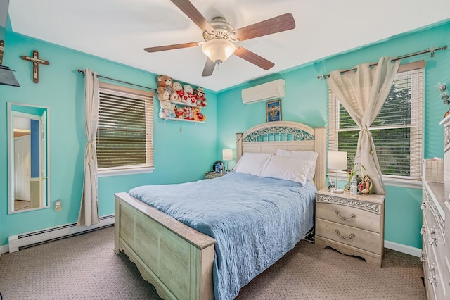320 Williams Way S, Baiting Hollow, NY 11933 - bedroom featuring a wall unit AC, a baseboard heating unit, carpet flooring, baseboards, and a ceiling fan