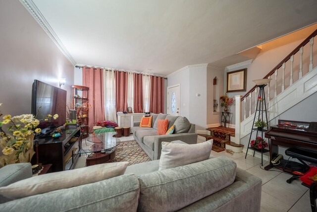 32-23 76th St, East Elmhurst, NY 11370 - living room featuring ornamental molding and stairs