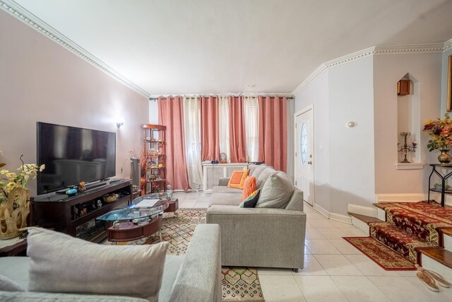 32-23 76th St, East Elmhurst, NY 11370 - living area featuring tile patterned flooring, ornamental molding, and baseboards