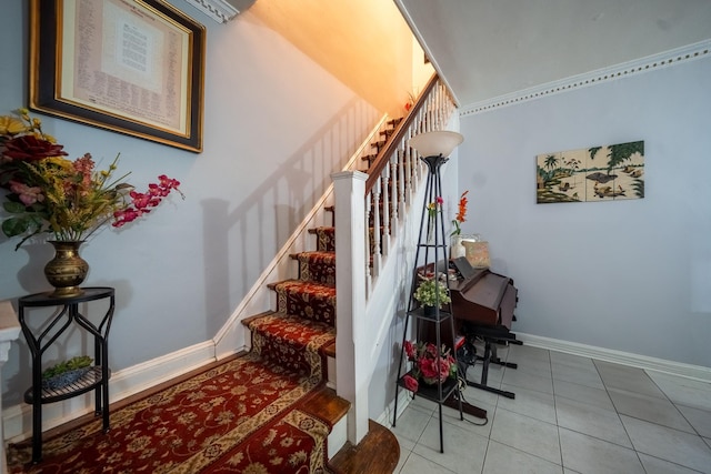32-23 76th St, East Elmhurst, NY 11370 - stairway with tile patterned floors and baseboards