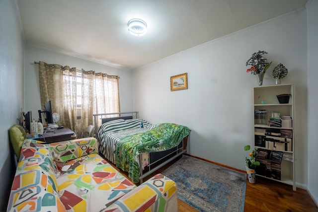 32-23 76th St, East Elmhurst, NY 11370 - bedroom featuring wood finished floors and baseboards
