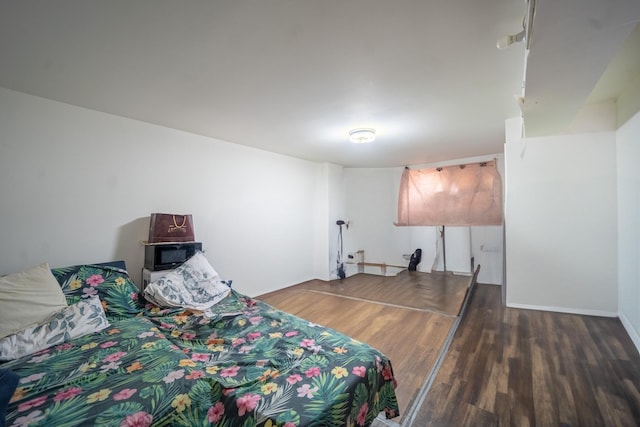 32-23 76th St, East Elmhurst, NY 11370 - bedroom featuring wood finished floors