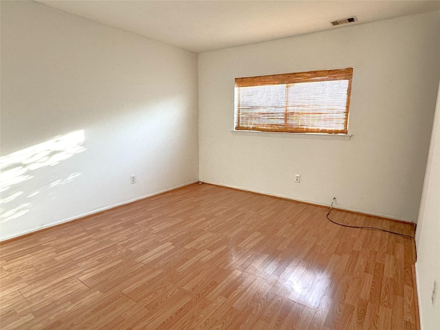 79 S Pointe Cir S Unit 79, Coram, NY 11727 - unfurnished room with light wood-style flooring and baseboards