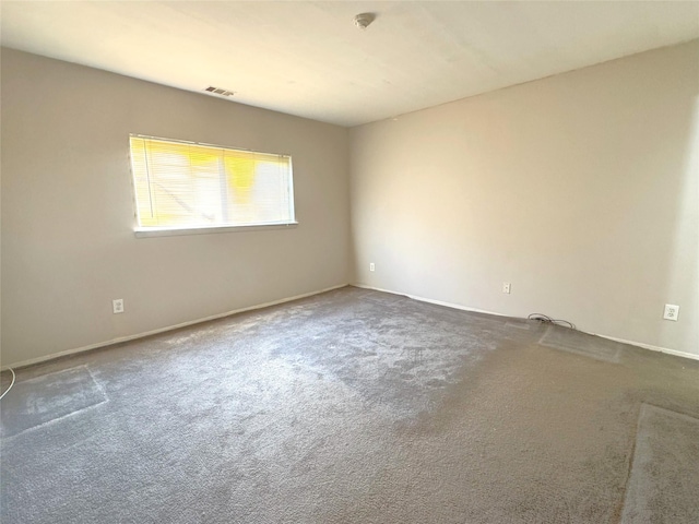 79 S Pointe Cir S Unit 79, Coram, NY 11727 - empty room with carpet floors, a smoke detector, and baseboards