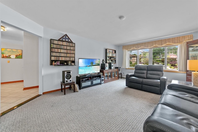336 Mile Square Rd, Yonkers, NY 10701 - carpeted living area featuring baseboards and tile patterned floors