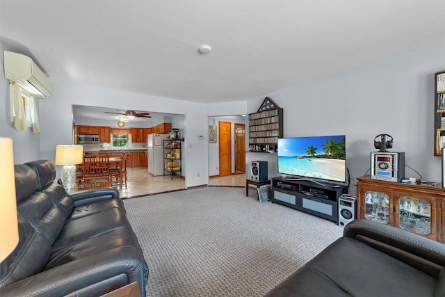 336 Mile Square Rd, Yonkers, NY 10701 - living area featuring a wall unit AC, light tile patterned floors, and a ceiling fan