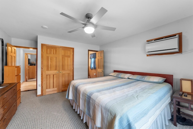 336 Mile Square Rd, Yonkers, NY 10701 - bedroom with light carpet, a wall mounted AC, a closet, and a ceiling fan