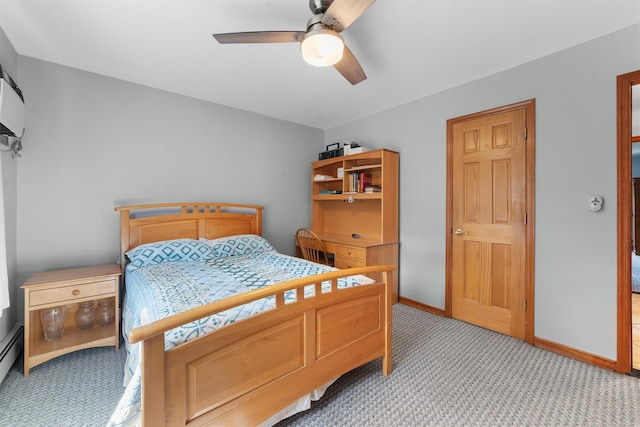 336 Mile Square Rd, Yonkers, NY 10701 - bedroom with light carpet, baseboards, ceiling fan, and baseboard heating