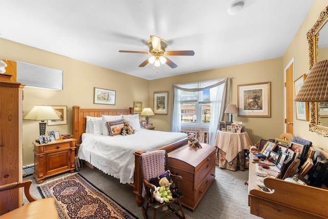 336 Mile Square Rd, Yonkers, NY 10701 - carpeted bedroom featuring a baseboard radiator and a ceiling fan