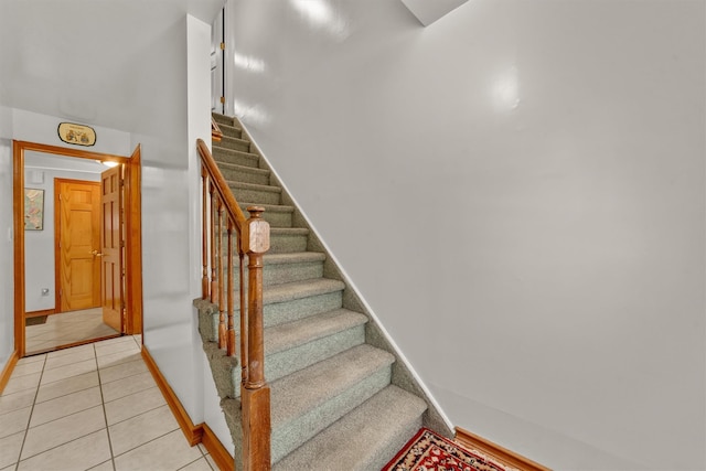 336 Mile Square Rd, Yonkers, NY 10701 - staircase featuring baseboards and tile patterned flooring