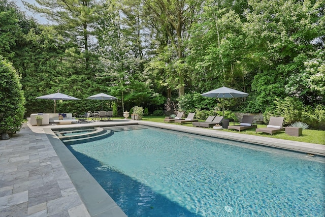 27 Olmsted Rd, Scarsdale, NY 10583 - view of pool featuring a patio area, outdoor dining area, and a pool with connected hot tub