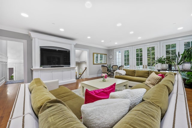 27 Olmsted Rd, Scarsdale, NY 10583 - living room with ornamental molding, wood finished floors, and recessed lighting