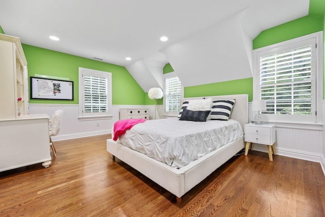 27 Olmsted Rd, Scarsdale, NY 10583 - bedroom with vaulted ceiling, wood finished floors, wainscoting, and recessed lighting