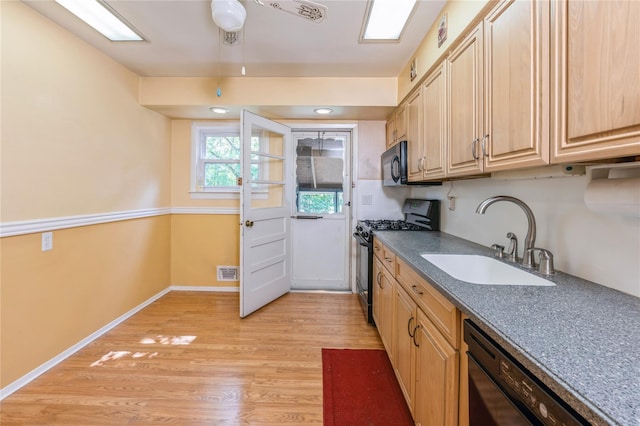 4 Roland Ct, Nanuet, NY 10954 - kitchen featuring black appliances, light wood-style floors, dark countertops, and light brown cabinetry