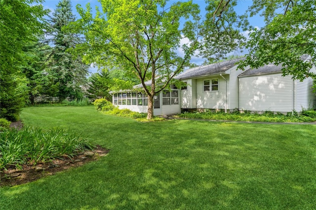 4 Roland Ct, Nanuet, NY 10954 - view of grassy yard with a sunroom
