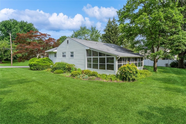4 Roland Ct, Nanuet, NY 10954 - view of side of home with a sunroom and a shingled roof