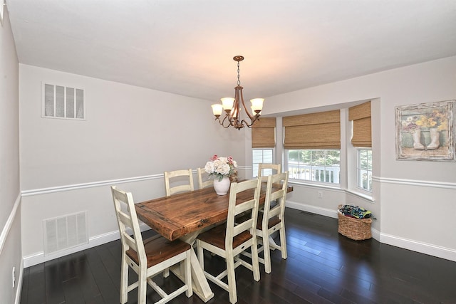 8 Thunder Rd, Miller Place, NY 11764 - dining space featuring baseboards, dark wood-type flooring, and a chandelier
