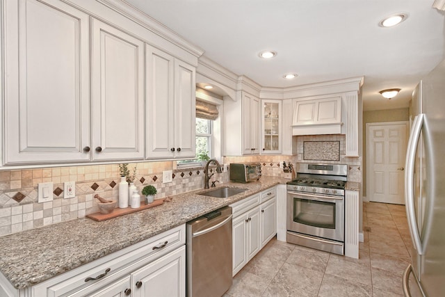 8 Thunder Rd, Miller Place, NY 11764 - kitchen featuring stainless steel appliances, a sink, backsplash, white cabinets, and recessed lighting