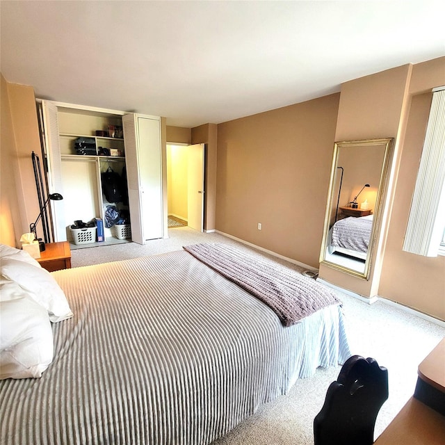 70-20 108th St Unit 4C, Forest Hills, NY 11375 - bedroom featuring carpet floors, a closet, and baseboards
