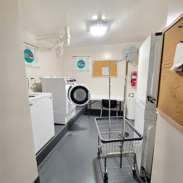 70-20 108th St Unit 4C, Forest Hills, NY 11375 - shared laundry room featuring washing machine and dryer and a ceiling fan