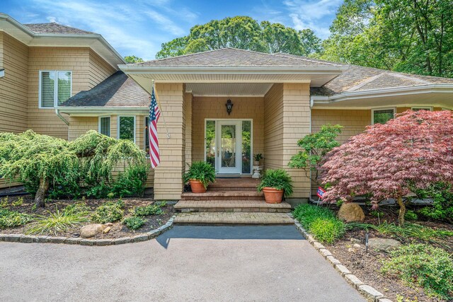 6 Ring Neck Ct, Wading River, NY 11792 - property entrance featuring a shingled roof
