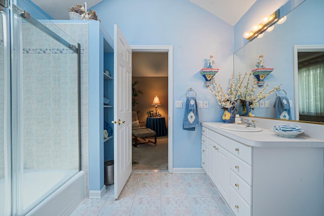 6 Ring Neck Ct, Wading River, NY 11792 - ensuite bathroom featuring vanity, lofted ceiling, shower / bath combination with glass door, and tile patterned flooring
