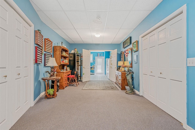 6 Ring Neck Ct, Wading River, NY 11792 - carpeted foyer entrance with a paneled ceiling and baseboards