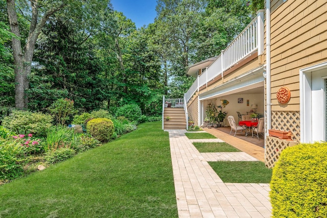 6 Ring Neck Ct, Wading River, NY 11792 - view of grassy yard with a patio area, stairway, and a balcony