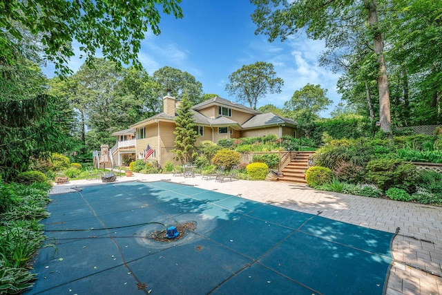 6 Ring Neck Ct, Wading River, NY 11792 - view of swimming pool featuring stairs, a covered pool, and a patio