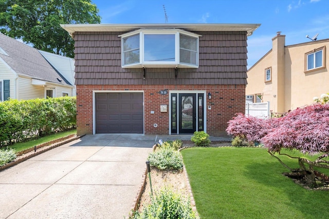 78-30 270th St, New Hyde Park, NY 11040 - view of front of property with brick siding, an attached garage, concrete driveway, and mansard roof