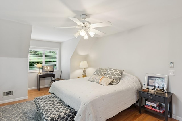 26405 Main Rd, Cutchogue, NY 11935 - bedroom featuring wood finished floors and a ceiling fan