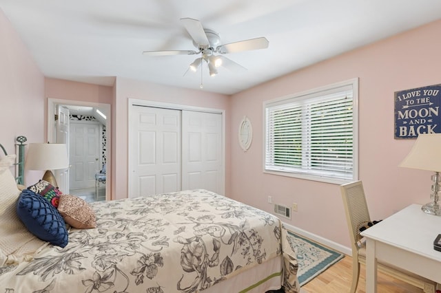 26405 Main Rd, Cutchogue, NY 11935 - bedroom featuring wood finished floors, a closet, and a ceiling fan