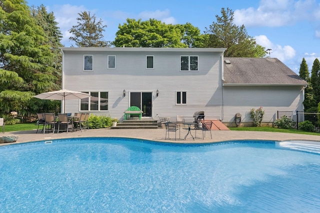 26405 Main Rd, Cutchogue, NY 11935 - view of swimming pool with a patio, outdoor dining space, grilling area, and entry steps