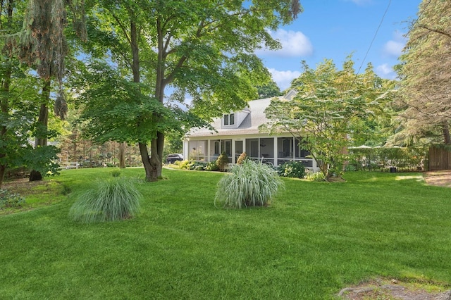 26405 Main Rd, Cutchogue, NY 11935 - view of green lawn with a sunroom