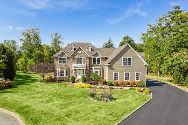 226 Windsor Rd, Fishkill, NY 12524 - view of front of property featuring stone siding and a front lawn