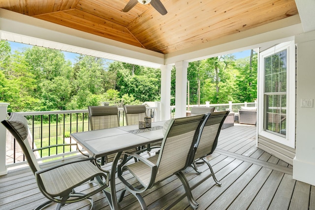 226 Windsor Rd, Fishkill, NY 12524 - wooden terrace with ceiling fan, outdoor dining space, and view of wooded area