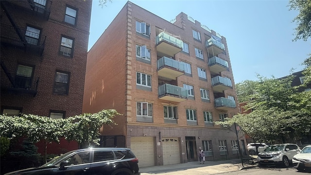 8510 Elmhurst Ave Unit 6B, Elmhurst, NY 11373 - view of apartment building / complex featuring an attached garage