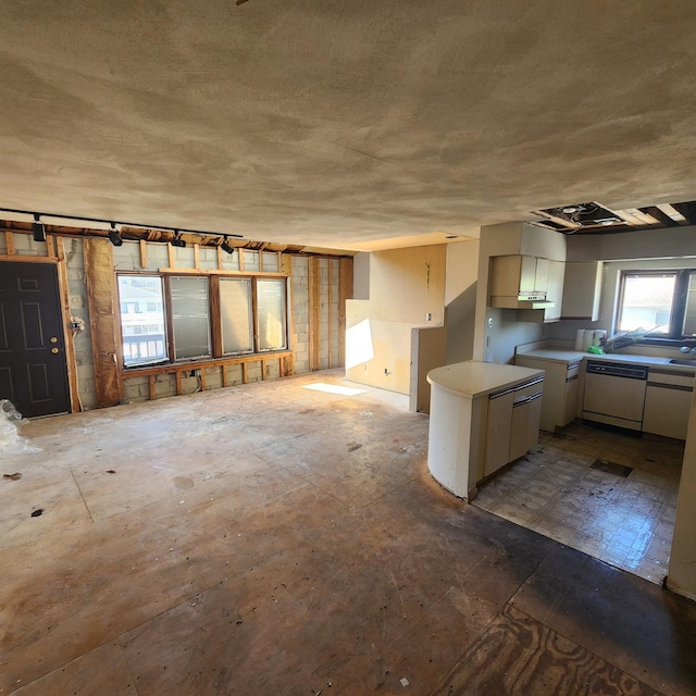639 E Broadway Unit 5, Long Beach, NY 11561 - kitchen featuring white dishwasher and white cabinetry