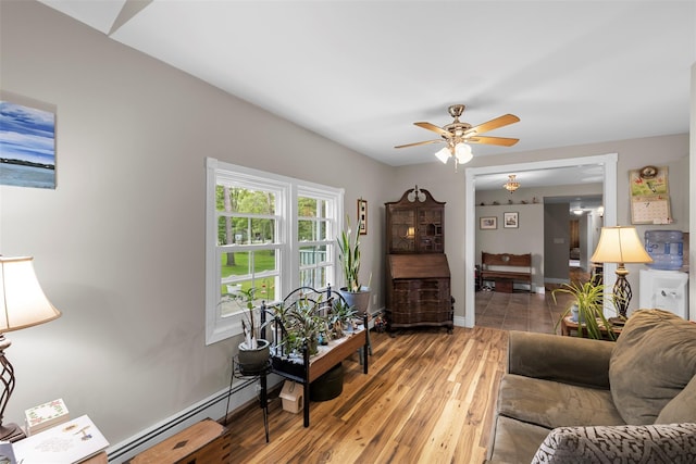 2410 Bruynswick Rd, Wallkill, NY 12589 - living area with a ceiling fan, light wood-style floors, and baseboards