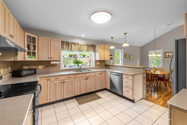 2410 Bruynswick Rd, Wallkill, NY 12589 - kitchen featuring appliances with stainless steel finishes, under cabinet range hood, light brown cabinets, a peninsula, and a sink