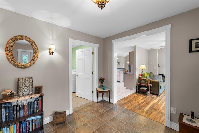 2410 Bruynswick Rd, Wallkill, NY 12589 - corridor featuring baseboards and stone finish floors