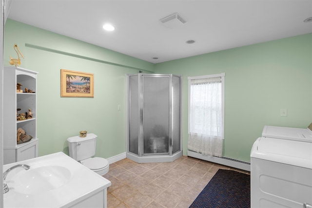 2410 Bruynswick Rd, Wallkill, NY 12589 - full bathroom with separate washer and dryer, a baseboard radiator, a sink, a stall shower, and toilet